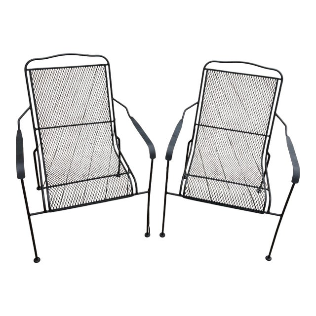 Mid-Century Modern Black Wrought Iron Mesh Patio Lounge Chairs - A Pair For Sale