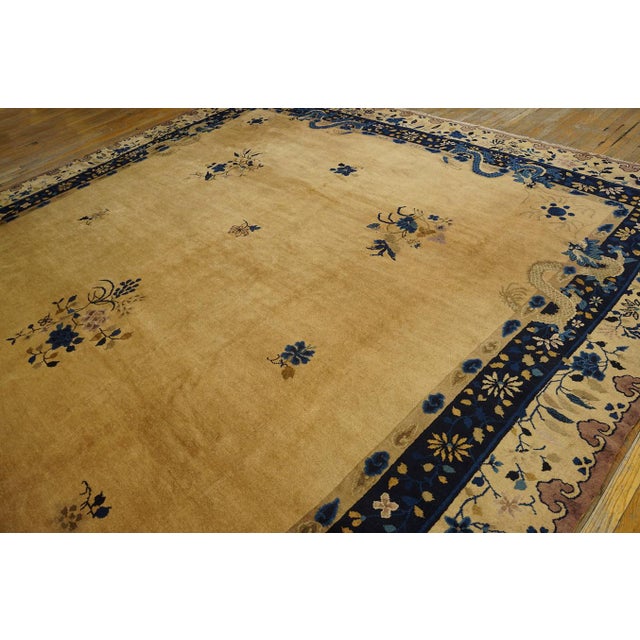 Antique Large Chinese Allover Floral Knotted Rug, Circa Date: 1920s. This exceptional piece exemplifies the refined...
