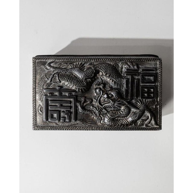 This rare antique Japanese box from the early 19th century is an exceptional example of decorative craftsmanship,...