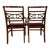 A handsome pair of vintage American Colonial Revival captain’s armchairs crafted from solid hardwood and dating to...