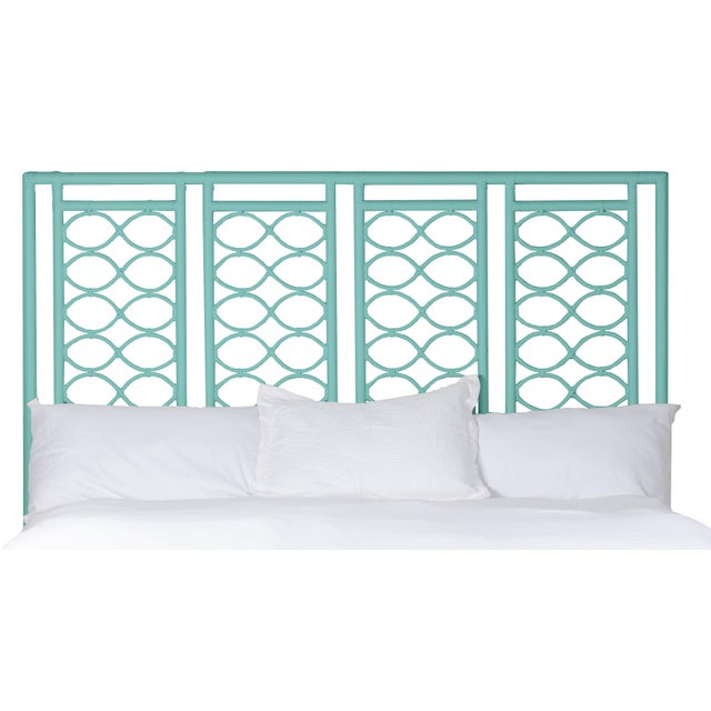 This headboard features classic Rattan design in a geometric pattern. Constructed of solid rattan and hand bound with...