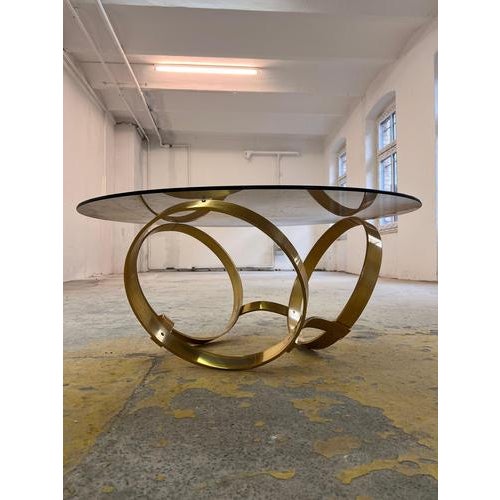The table is attributed to Knut Hesterberg for Ronald Schmitt. This coffee table is a statement piece that brings the bold...