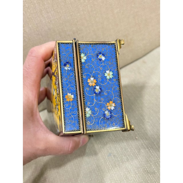 An exceptional and beautifully executed Japanese cloisonne enamel box signed Inaba, dating to the Meiji period, circa...