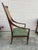 Very unique chair with dramatic lines and colorful upholstery. This Mid Century beauty has an extra tall rattan back with...