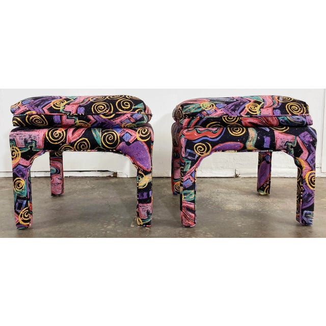 Vintage pair of ample sized Postmodern parsons stools in vibrant abstract fabric. Piped pillow top and frames. A fabulous...