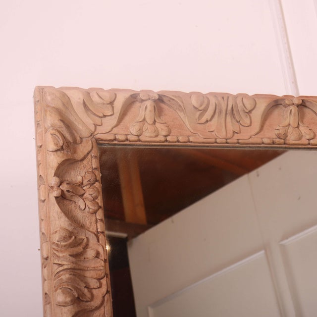 Huge 19th C carved Italian walnut wall mirror. 1890 This piece is designed in the style of the selected designer and/or...