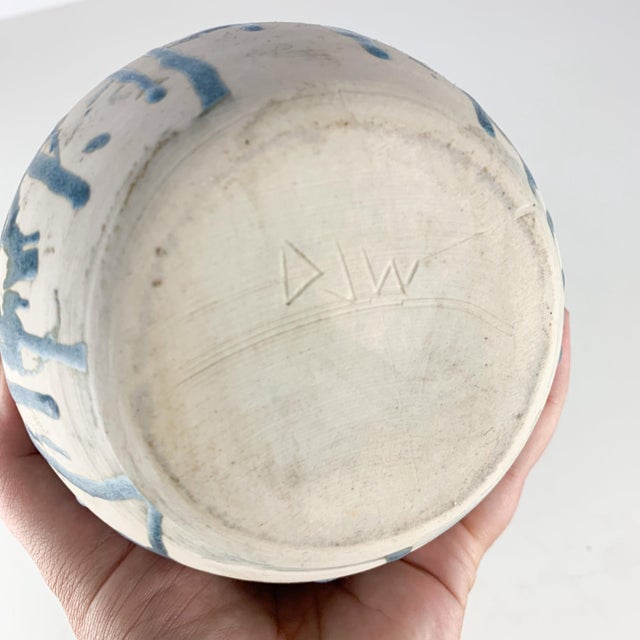 Incredible one of a kind studio pottery art vase with long skinny neck and fabulous blue drippy glaze bottom signed DJW....