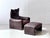 The iconic "maralunga" lounge chair with matching ottoman, designed by vico magistretti for cassina in the 1970s. This...