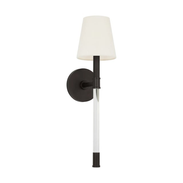 Slender curved, tapered arms form an elegant, dynamic silhouette . In the Hanover one-light wall sconce, a lucite arm...