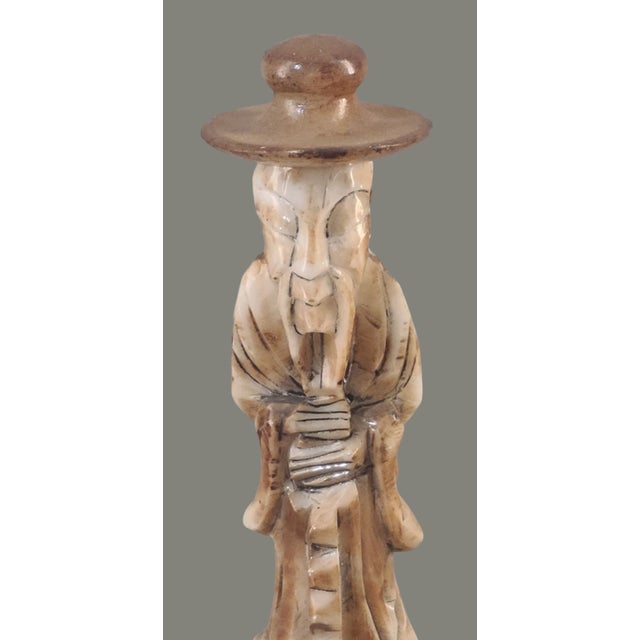 Delve into the serene beauty of this Vintage Asian Figural Holy Man Carved Soapstone Trinket Holder, a true testament to...