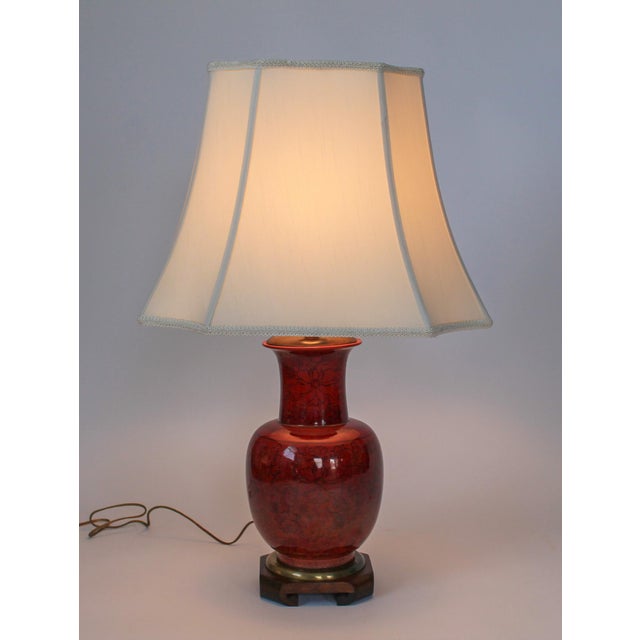 Vintage Asian Style Frederick Cooper dark red ceramic, wood and brass table lamp with floral motif. Shade is not included....