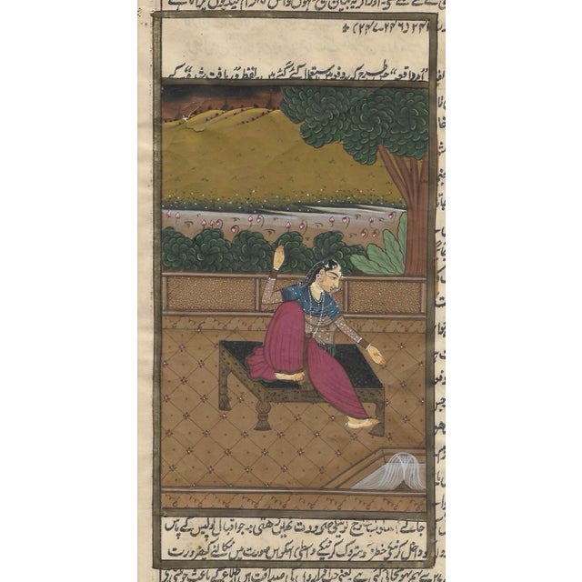 Antique Bundi painting of an Indian figure in a courtyard. The painting is gouache on a page of text, there is a short...