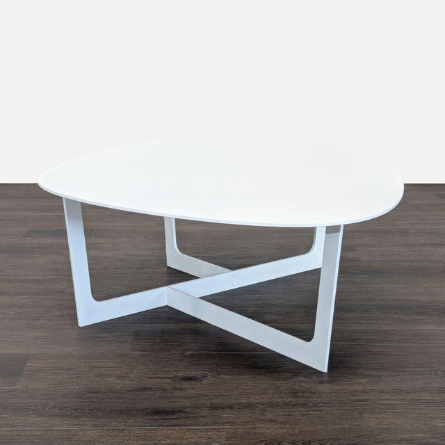 This Insula Coffee table was designed by the Danish duo, Ernst & Jensen. This table was produced by Erik Jorgensen in...