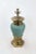 Vintage porcelain lamp glazed in a robin egg blue and nestled in golden bronze hardware. Can be a set with its twin.