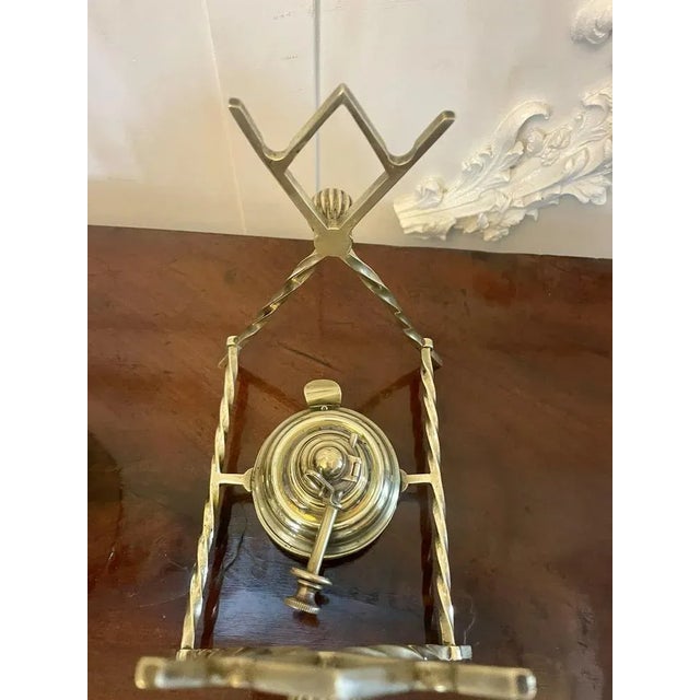 Antique Victorian quality brass spirit kettle on stand having a quality ornate brass kettle on its original stand with the...