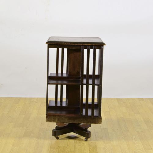 This splendid two-tier revolving bookcase represents a classic example of 19th-century english cabinetmaking. Crafted from...