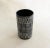 Small mid-century roll vase, straight cylindrical body, in earthenware with a matte black glaze, decorated with geometric...