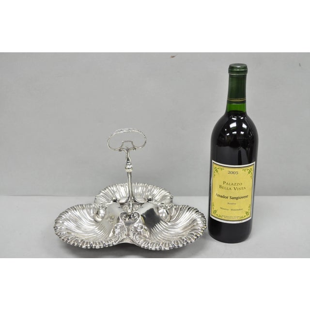 Antique English Victorian Silver Plated Triple Clam Shell Nautical Candy Dish. Circa Mid 20th Century. Measurements: 8" H...