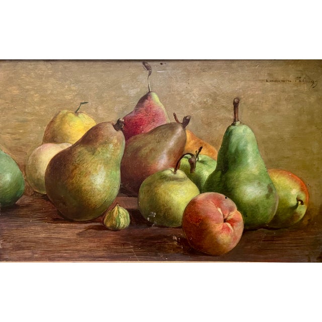 Oil on wood still life with pears, signed upper right, late 19th/early 20th century. This still life presents a warm...