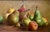Oil on wood still life with pears, signed upper right, late 19th/early 20th century. This still life presents a warm...