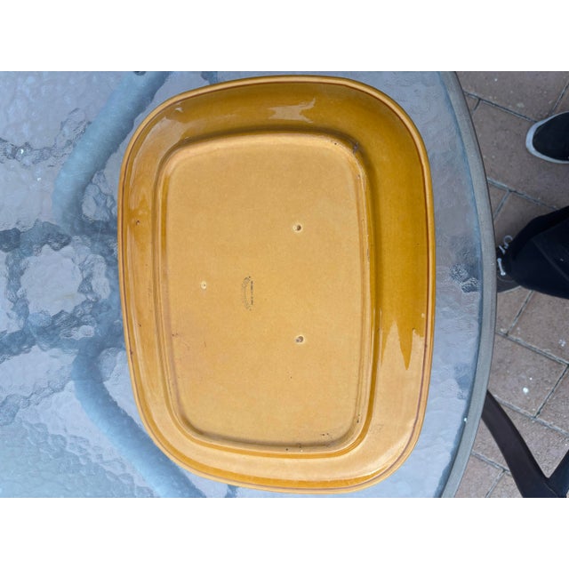 Franciscan Wheat Platter in the rust color. This platter is so heavy and nice, it will last for a long time.