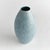 With a streamlined shape, reactive glaze and highly textured organic dot pattern, this decorative vase is a true work of...
