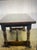 Large oak refectory table featuring turned legs, a sturdy stretcher base and bread board top. The table surface showcases...