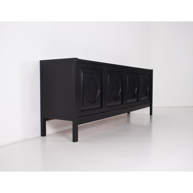 Brutalist 4-door sideboard in blackened oak, belgium, 1970s. A very small impact mark on the top of the sideboard (see...