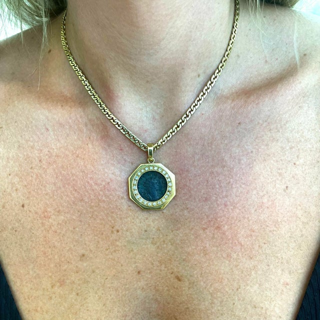 Metal Type: 18K Yellow Gold Chain Length: 16.00 inches Pendant Diameter: 28.00 mm Chain Width: 4.10 mm Chain Weight: 25.94...