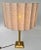 High, solid, but elegant vintage brass table lamp from Belgian 'DeKnudt' with a new sand-colored shade. This piece is...