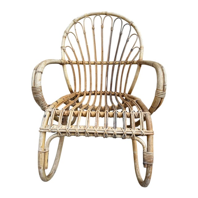 This low rattan armchair dates back to the 1950s. It is likely a Dutch model, made in the Frisian town of Noordwolde,...