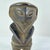 The Azande figure was hand-carved by the Azande artisans of the Democratic Republic of the Congo, but the Azande community...