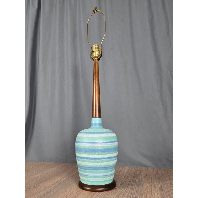 Outstanding glaze on this period table lamp. Unmarked but nicely made, tidy glaze work that has a bit of a lava effect....