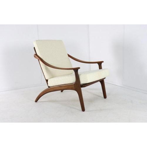 This iconic armchair by Arne Hovmand-Olsen for Komfort is a masterful example of Danish design at its best. The design...