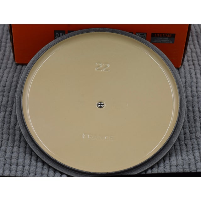Elevate your kitchen with this brand-new, authentic Le Creuset Signature Enameled Cast Iron Round Dutch Oven in the...