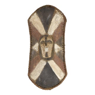 Early 20th Century Songye Shield with Kifwebe Mask Icon For Sale