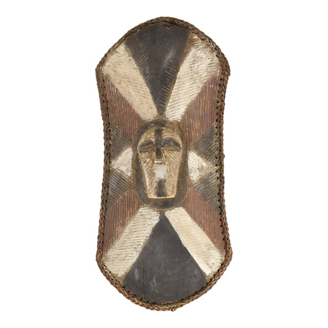 Early 20th Century Songye Shield with Kifwebe Mask Icon For Sale