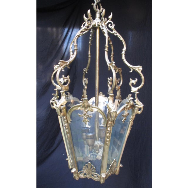French Brass and Glass 6-pane lantern. Fine brass French Cylindar Lantern. A central stem holds 4 Edison sockets. The...