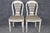 Representing the pinnacle of mid-century European luxury and design, this exceptional set of eight signed Maison Jansen...