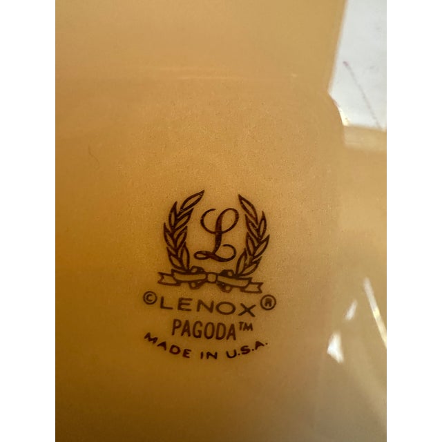 LENOX "Pagoda" pattern 11 inches cake platter features a beautiful ivory blue floral design with 24K gold trim and a...