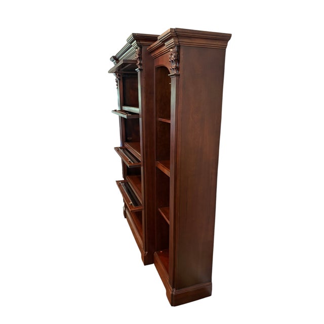 Quick Hits: Brand: Hooker Furniture Style: Traditional, Neoclassical Materials: Wood with cherry finish, glass panes,...