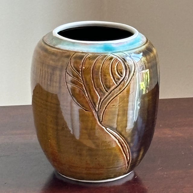 Just love this little mid- to late-20th century studio pottery vase! Beautiful earthy color palette with leaf motif and a...