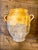 19th-century French terracotta confit pot with a warm ochre -yellow glaze and traditional double handles. Originally used...