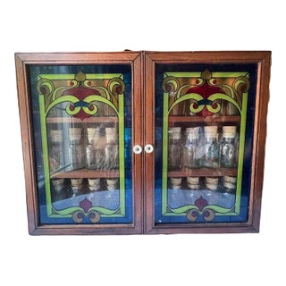 Late 20th Century Vintage Art Deco Style Painted Glass Panel Spice Rack Cabinet With 30 Bottles For Sale