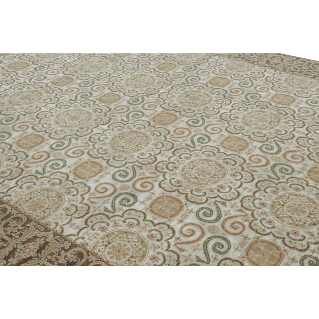 Hand-knotted in wool and silk in our most luxurious Nepalese pile, this 10x14 modern rug features an especially notable...