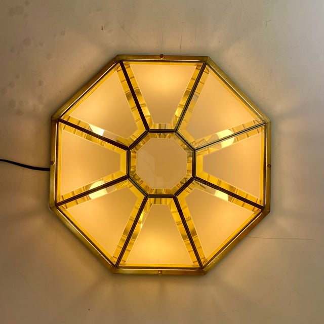 Beautiful octagon-shaped flush-mount light in full brass and cut-glass assembled as tiffany stained glass. Designed in...