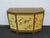 This wonderful Buffet Storage Cabinet is made out of wood. The Server has a Hollywood Regency Asian style Chinoiserie...
