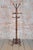 This freestanding coat rack is a monumental and highly elegant example of craftsmanship from the late 19th century, made...