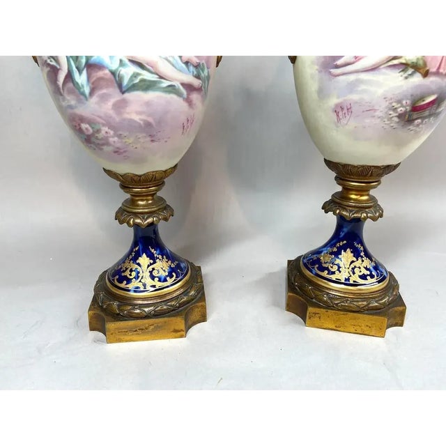 Pair of 19th-Century French Sevres Porcelain Vases With Gilded Bronze Mounts For Sale - Image 10 of 12
