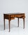 A classic Edwardian desk featuring a leather writing surface, combining refined craftsmanship with everyday usability. The...